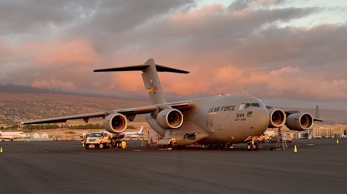 US Air Force transport aircraft on the ramp at sunset